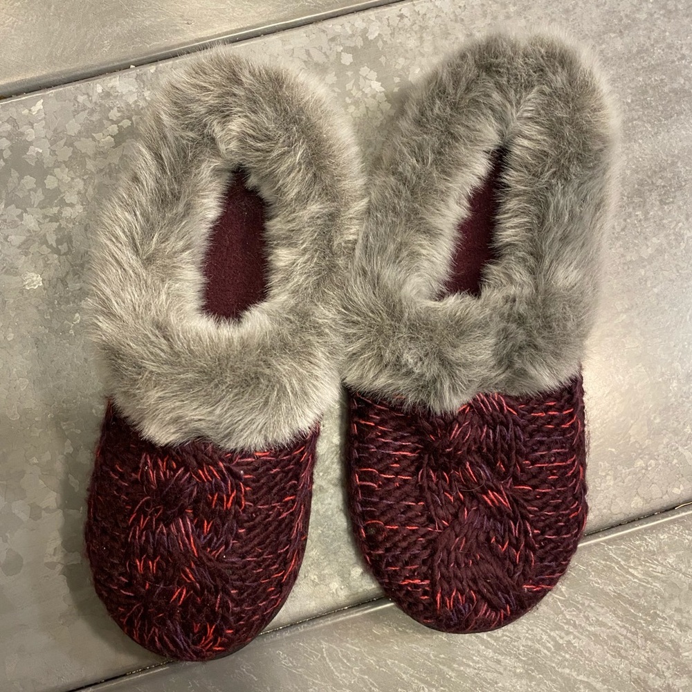 Purple slippers with grey fur
